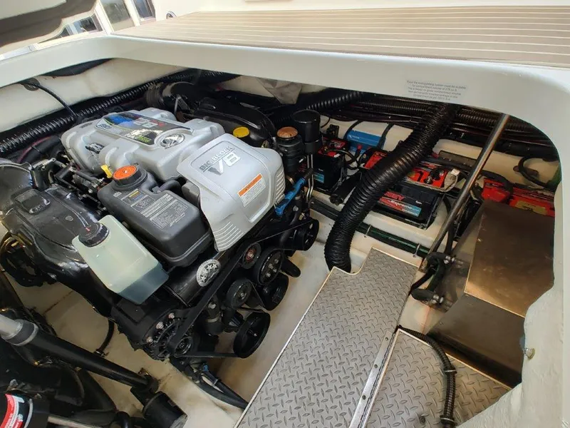 Slide: The Image of 2018 Formula 350 Crossover Bowrider engine compartment with V8 engine and components. - 49
