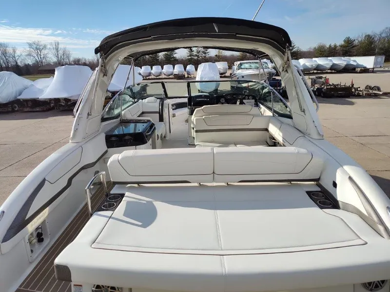 Slide: The Image of 2018 Formula 350 Crossover Bowrider with spacious seating and sleek design. - 9