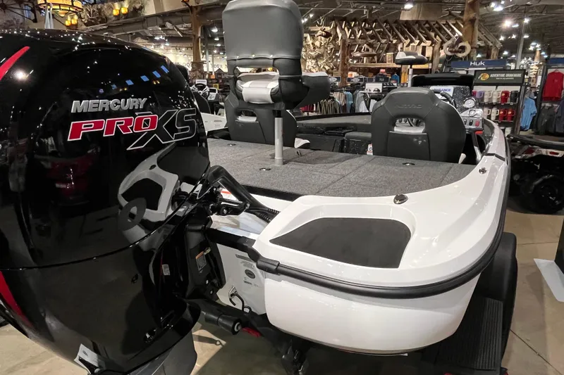 Slide: The Image of 2025 Nitro Z18 boat with Mercury Pro XS engine displayed indoors. - 6