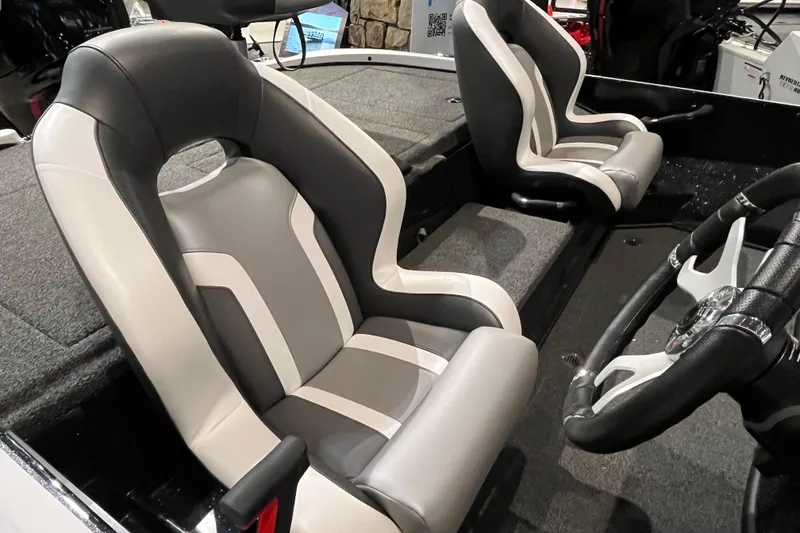 Slide: The Image of 2025 Nitro Z18 boat interior with sleek, modern seats and steering wheel. - 8
