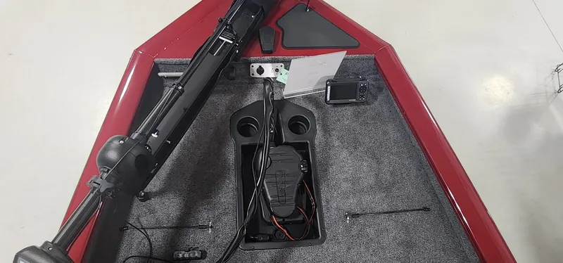 Slide: The Image of 2025 Tracker Pro Team 190 boat interior with trolling motor and control panel. - 4