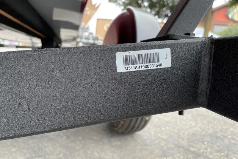 Slide: The Image of 2025 Tracker Bass Tracker Classic XL trailer with visible barcode and serial number. - 67