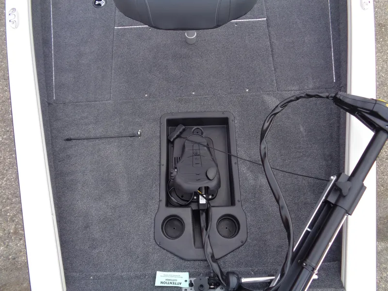 Slide: The Image of 2025 Tracker Pro Team 175 boat interior with trolling motor and carpeted deck. - 11