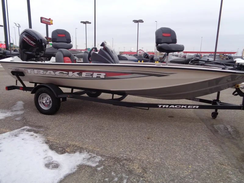 Slide: The Image of 2025 Tracker Pro Team 175 boat on trailer in parking lot. - 4