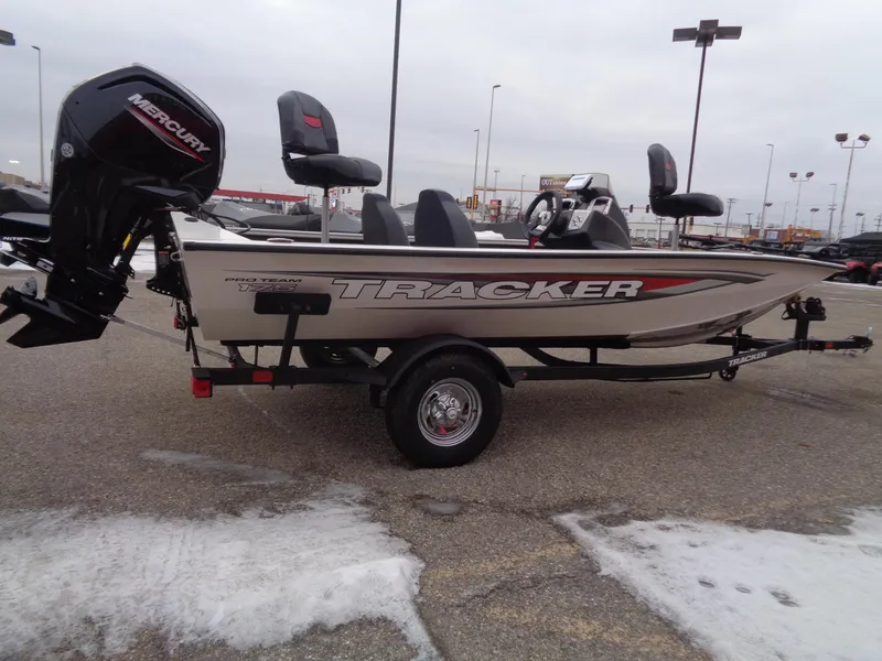 Slide: The Image of 2025 Tracker Pro Team 175 boat with Mercury engine on trailer in parking lot. - 5