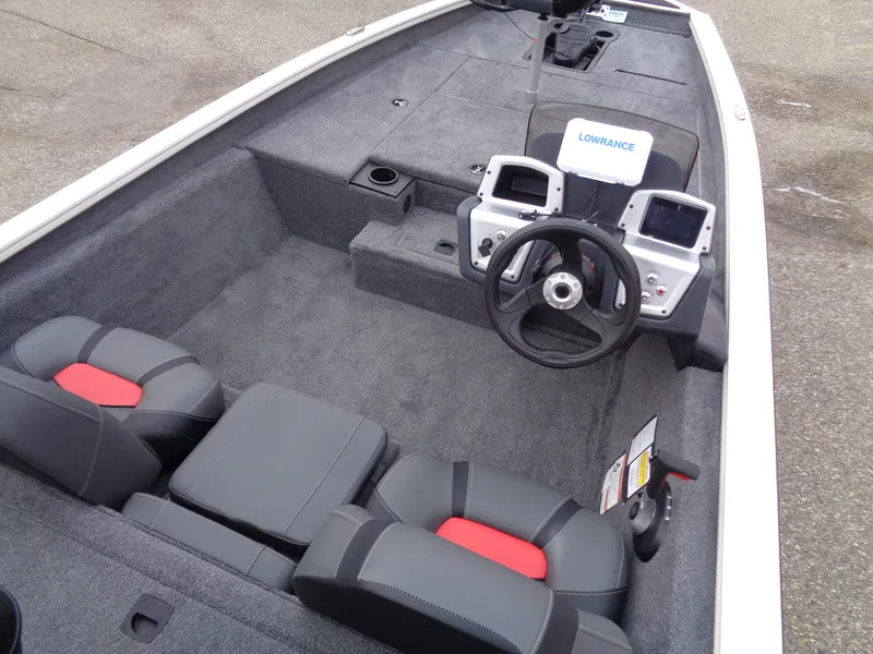 Slide: The Image of 2025 Tracker Pro Team 175 boat interior with dual consoles and steering wheel. - 8