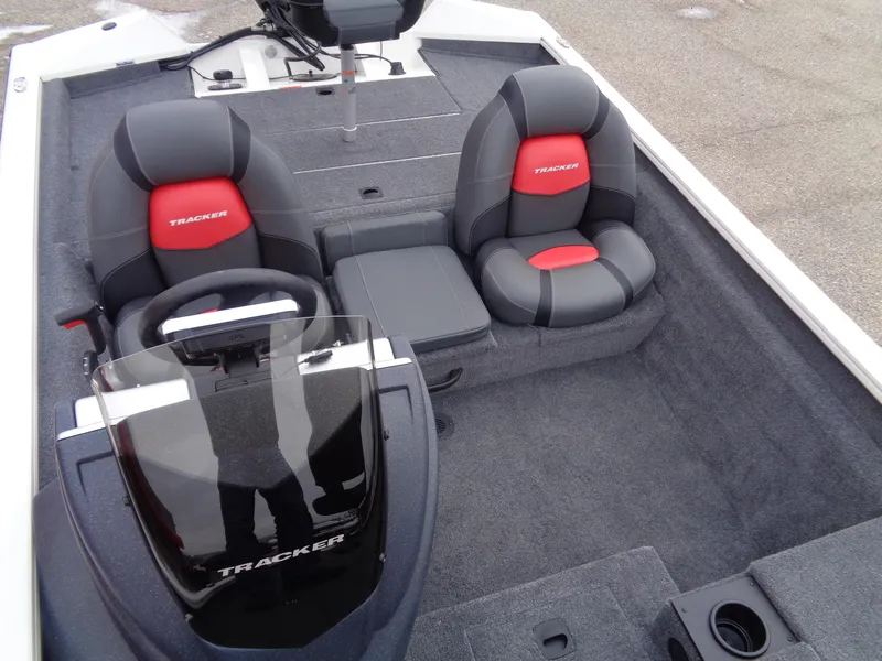 Slide: The Image of 2025 Tracker Pro Team 175 boat interior with dual seats and steering console. - 9