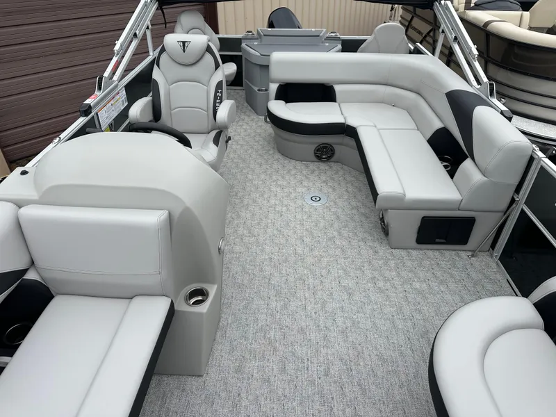 Slide: The Image of 2025 Trifecta 22 TRFCLE pontoon boat interior with plush seating and modern design. - 4