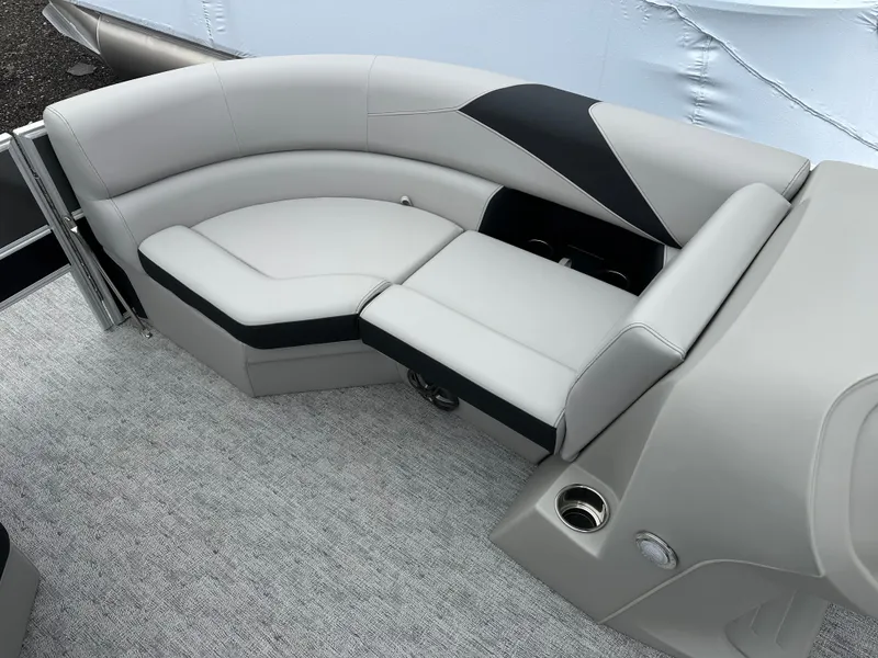 Slide: The Image of Luxurious seating on 2025 Trifecta 22 TRFCLE pontoon boat, featuring sleek gray upholstery. - 7