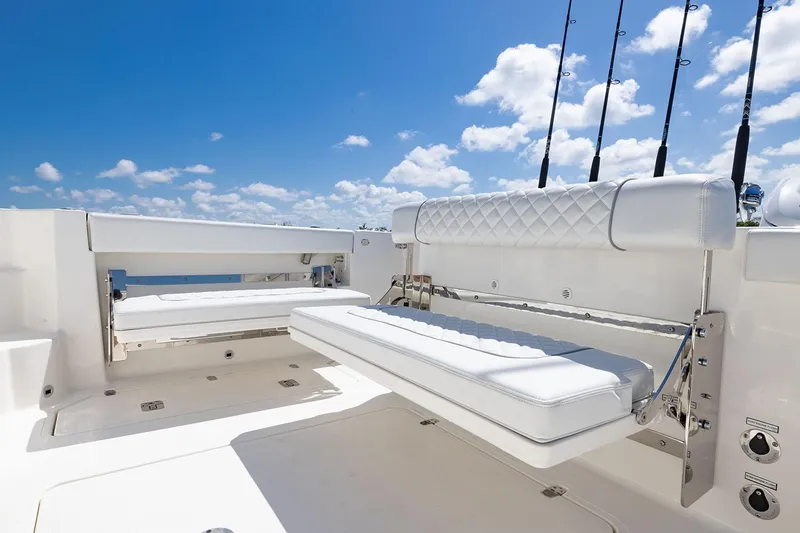 Slide: The Image of Interior view of 2025 Pursuit OS 325 Offshore boat ceiling with hatches and speakers. - 23