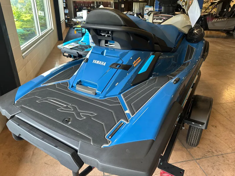 Slide: The Image of 2025 Yamaha WaveRunner FX Limited SVHO in showroom, blue and black design. - 8