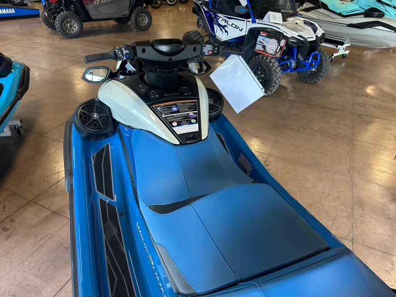 Slide: The Image of 2025 Yamaha WaveRunner FX Limited SVHO in showroom, blue and white design. - 9