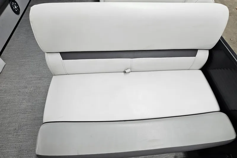 Slide: The Image of White and gray seating on 2022 Sweetwater 2286 boat, featuring modern design. - 17