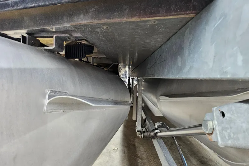 Slide: The Image of Close-up of 2022 Sweetwater 2286 pontoon boat underside and pontoons. - 9