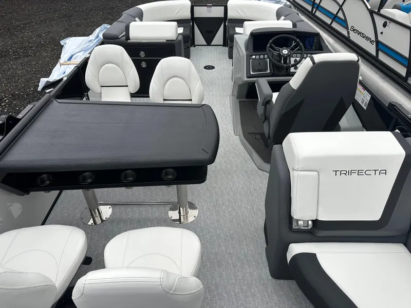 Slide: The Image of Luxurious 2025 Trifecta 23 RFESS boat interior with sleek seating and modern dashboard. - 5
