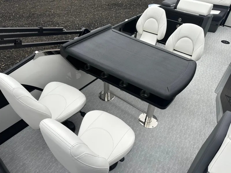 Slide: The Image of 2025 Trifecta 23 RFESS boat interior with sleek seating and table design. - 6