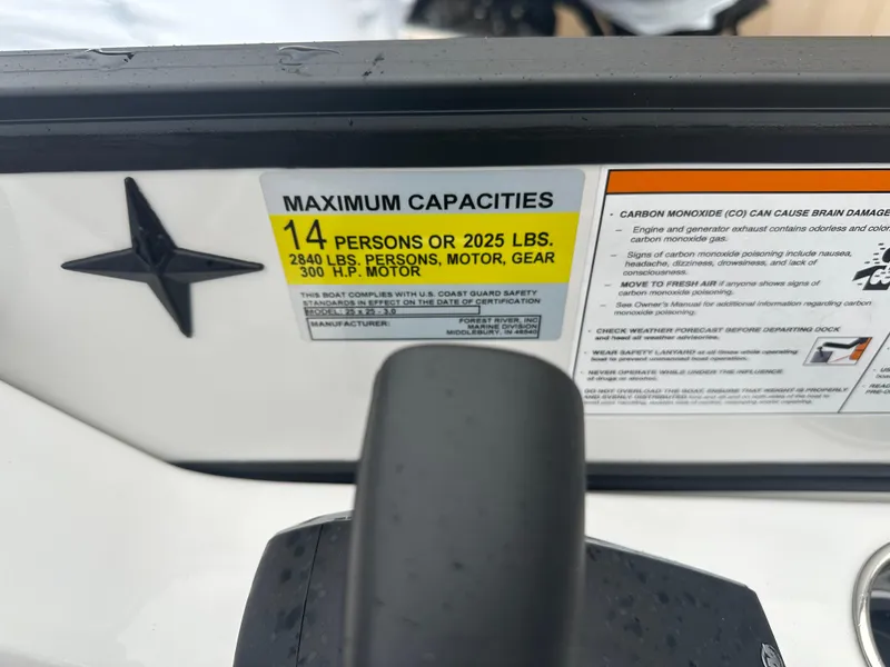 Slide: The Image of 2025 Berkshire 25 ULDCSTS boat capacity label, 14 persons or 2025 lbs, 300 HP motor. - 12