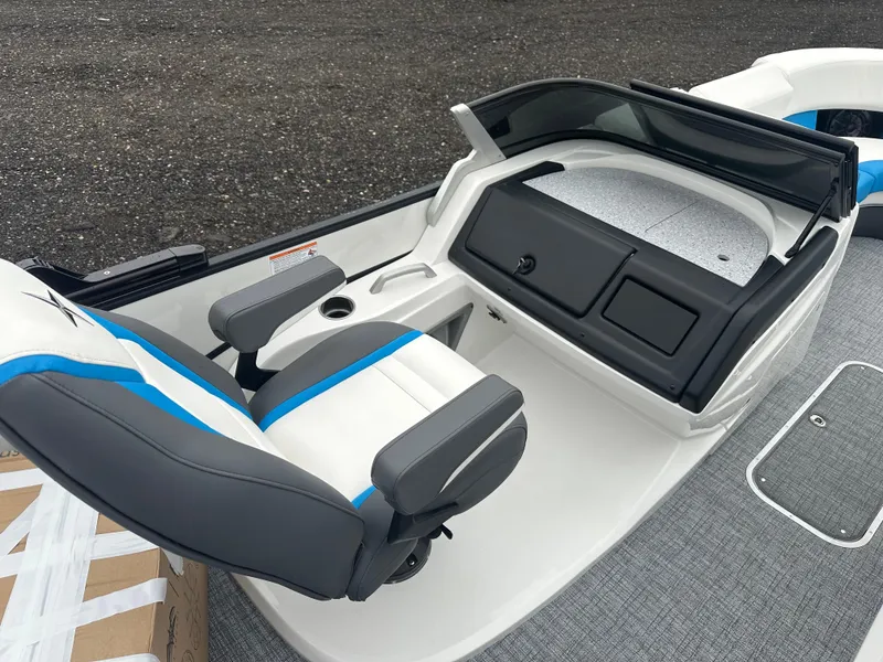 Slide: The Image of 2025 Berkshire 25 ULDCSTS boat interior with modern seating and dashboard. - 8