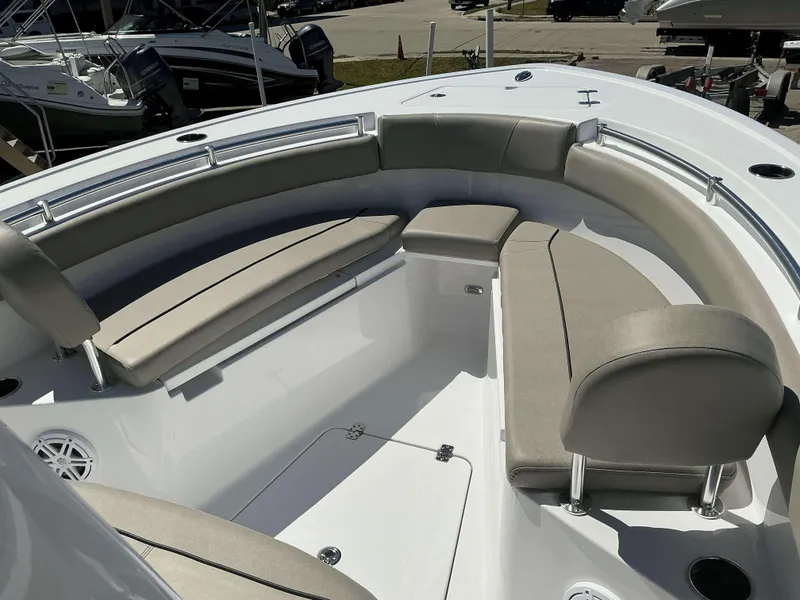 Slide: The Image of 2025 Sportsman 212 Open boat interior with cushioned seating and sleek design. - 10