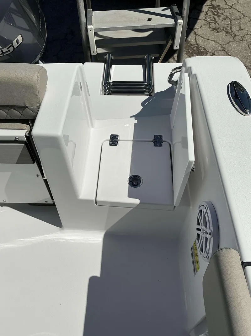 Slide: The Image of 2025 Sportsman 212 Open boat interior with ladder and storage compartment. - 16