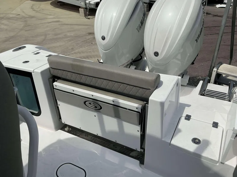 Slide: The Image of 2025 Sportsman 252 Open boat with dual Yamaha engines and cushioned seating. - 17