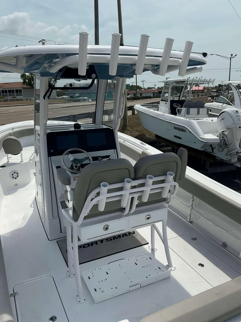 Slide: The Image of 2025 Sportsman 252 Open boat interior with dual seats and modern dashboard. - 6