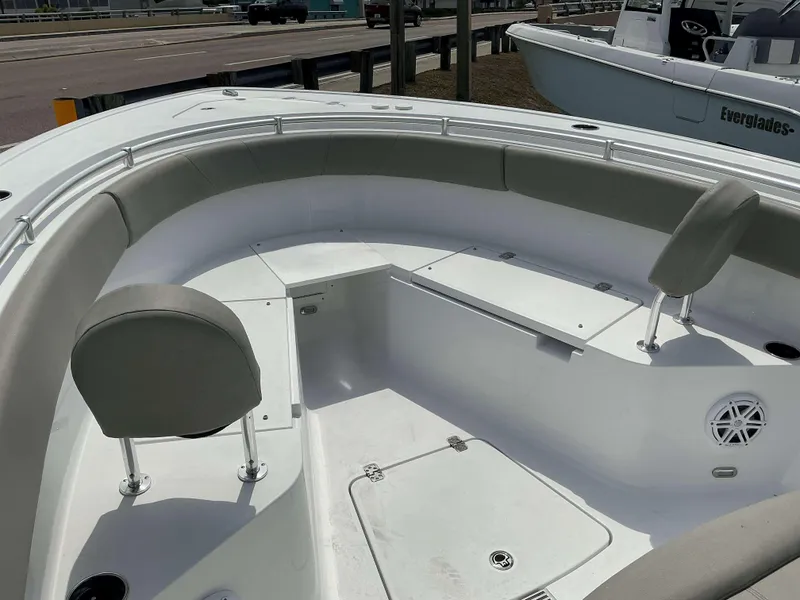 Slide: The Image of 2025 Sportsman 252 Open boat interior with seating and storage compartments. - 7