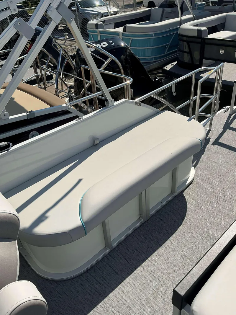 Slide: The Image of 2025 Sweetwater 2486 SFL pontoon boat with comfortable seating and sleek design. - 12