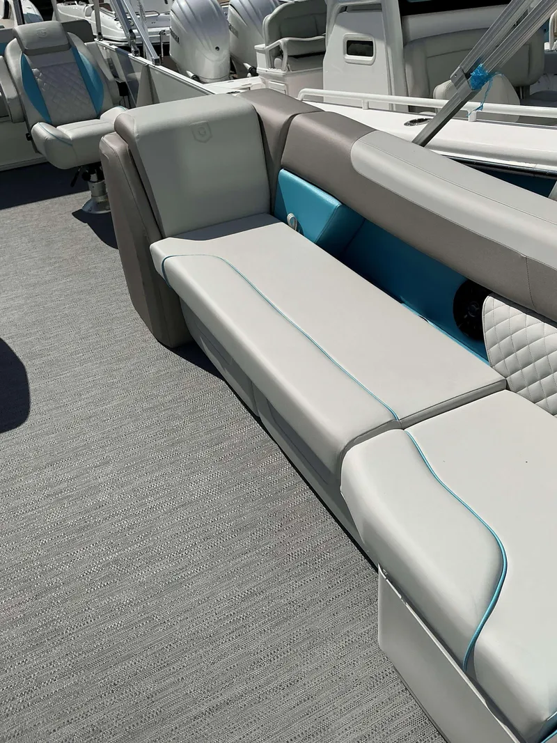 Slide: The Image of 2025 Sweetwater 2486 SFL boat interior with stylish seating and modern design. - 3