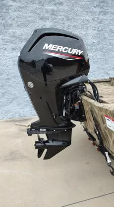 Slide: The Image of 2025 Lowe Roughneck RX1860 SC with Mercury outboard motor, side view. - 7