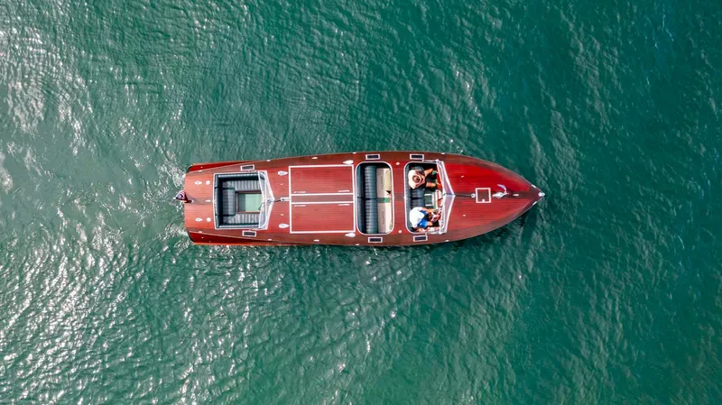 Slide: The Image of Aerial view of 1995 Custom Hugh Saint 34 Grand Prix boat on water. - 11