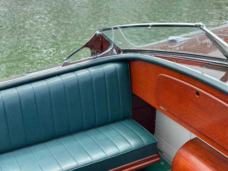 Slide: The Image of Interior of 1995 Custom Hugh Saint 34 Grand Prix boat with green leather seating. - 29