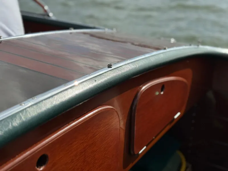 Slide: The Image of Close-up of 1995 Custom Hugh Saint 34 Grand Prix boat's wooden dashboard. - 34