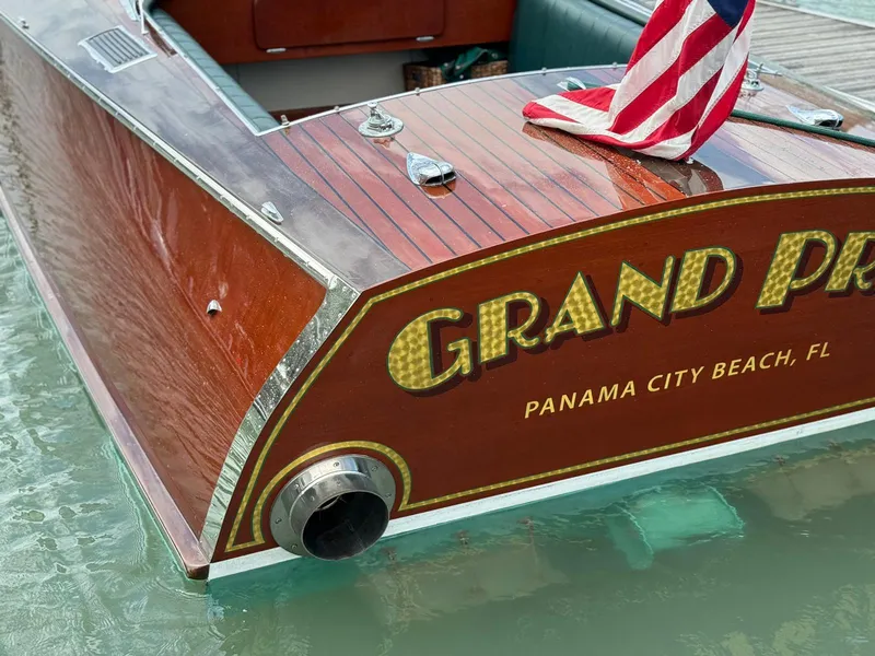 Slide: The Image of Vintage 1995 Hugh Saint 34 Grand Prix boat at Panama City Beach dock. - 36