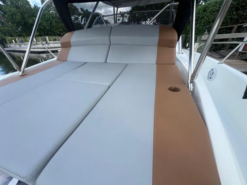 Slide: The Image of 2025 Beneteau Flyer 9 SUNdeck with spacious sunbathing area and sleek design. - 6