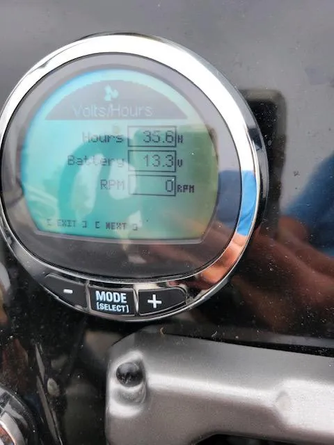Slide: The Image of Close-up of Nitro ZV19 Pro 2023 dashboard display showing hours, battery, and RPM. - 4