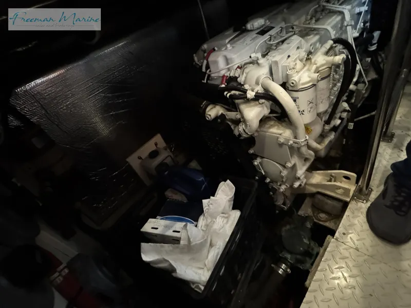 Slide: The Image of Engine room of 2001 Cruisers Yachts 4450 Express Motoryacht with visible machinery. - 41