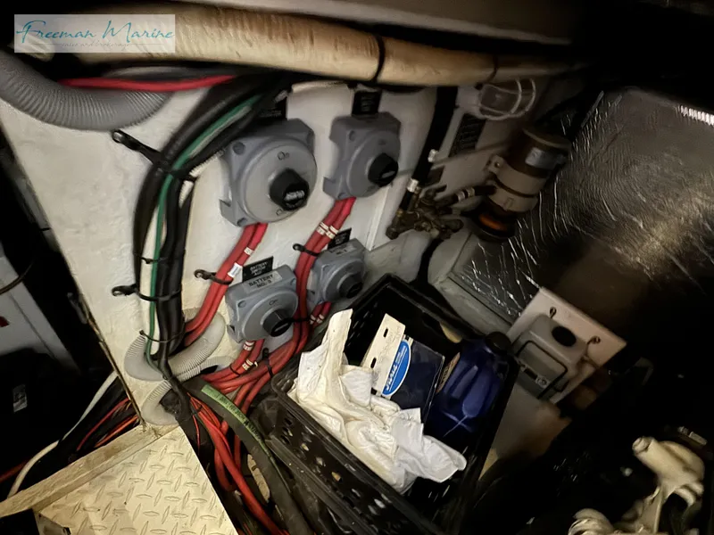 Slide: The Image of Engine room of 2001 Cruisers Yachts 4450 Express Motoryacht with wiring and switches. - 42