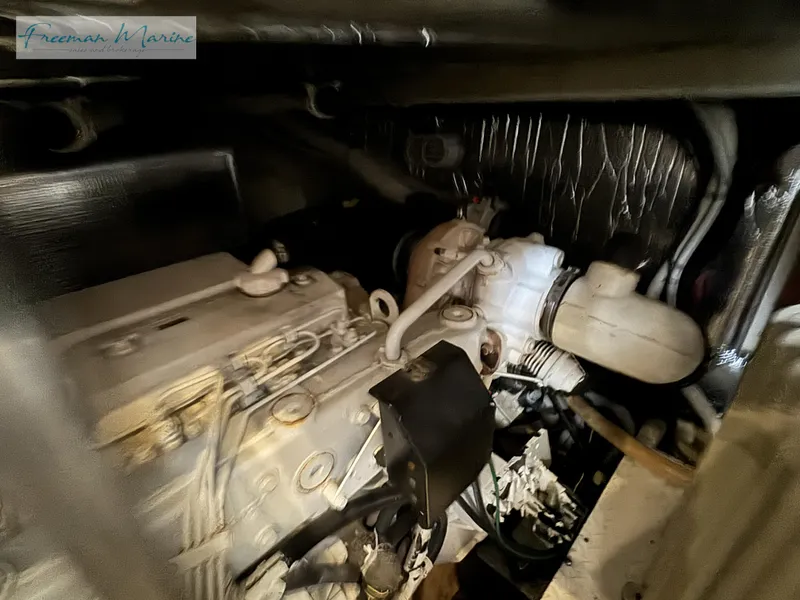 Slide: The Image of Engine room of 2001 Cruisers Yachts 4450 Express Motoryacht, showcasing mechanical components. - 45