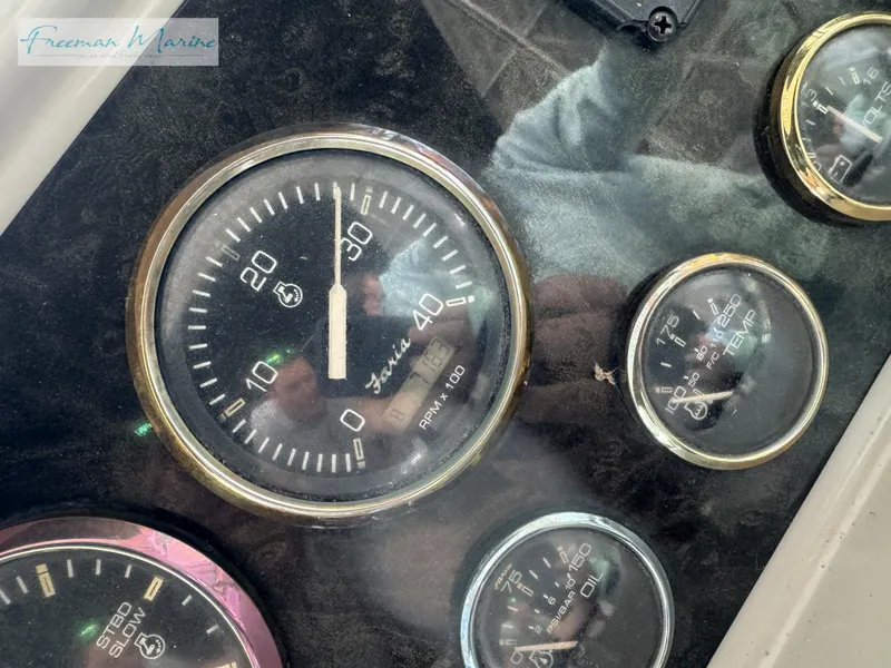 Slide: The Image of Close-up of 2001 Cruisers Yachts 4450 Express Motoryacht dashboard gauges. - 49