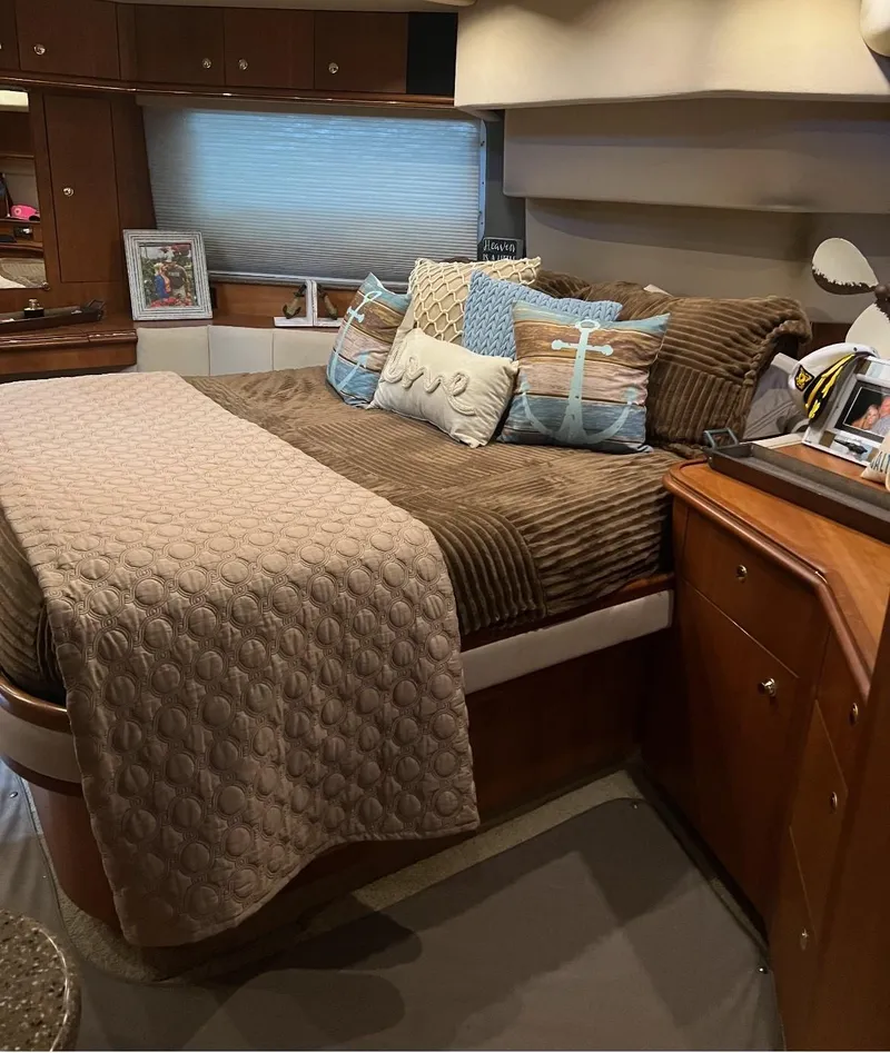 Slide: The Image of Luxurious bedroom interior of 2001 Cruisers Yachts 4450 Express Motoryacht. - 2