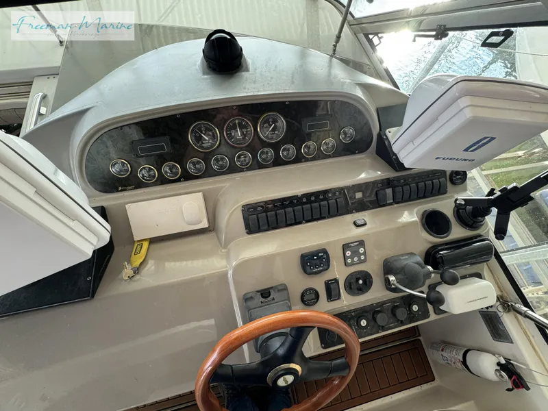 Slide: The Image of Dashboard of 2001 Cruisers Yachts 4450 Express Motoryacht with gauges and controls. - 31