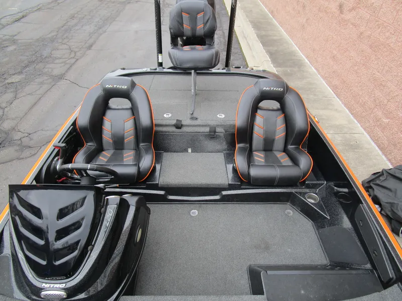 Slide: The Image of 2017 Nitro Z20 Z-Pro High Performance boat interior with sleek black and orange seats. - 20
