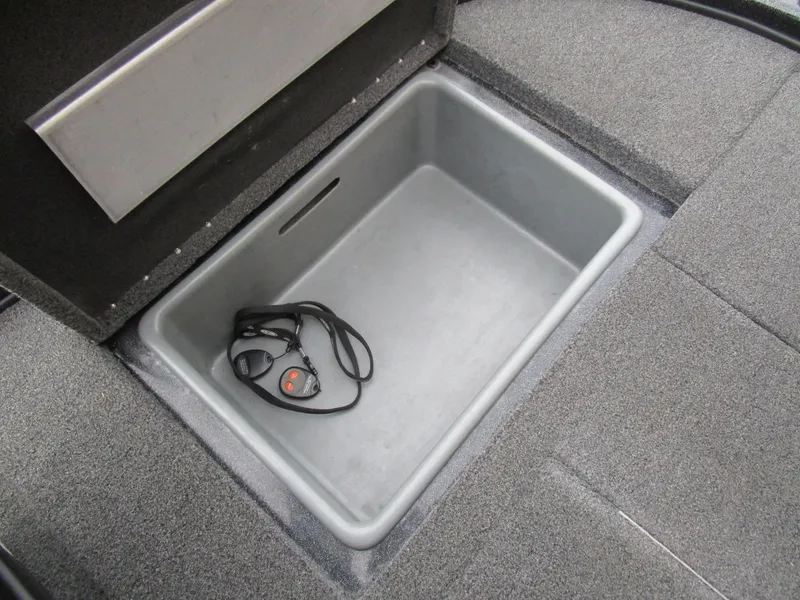 Slide: The Image of 2017 Nitro Z20 Z-Pro storage compartment with key lanyard inside. - 26