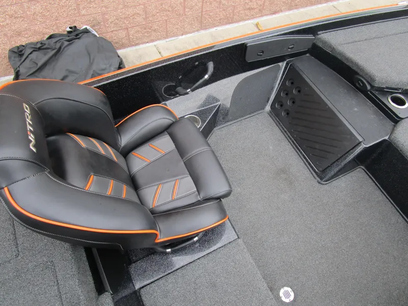 Slide: The Image of 2017 Nitro Z20 Z-Pro boat interior with black and orange seating. - 29