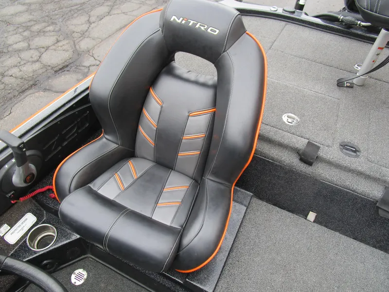 Slide: The Image of 2017 Nitro Z20 Z-Pro boat seat with black and orange design. - 33