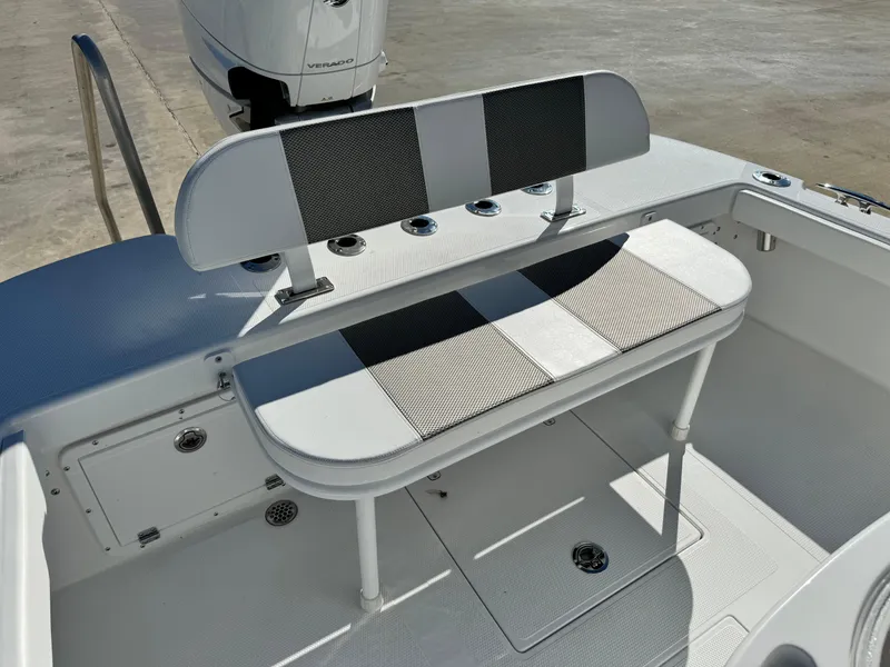 Slide: The Image of 2025 BlackJack 256 Coastal boat seating area with modern design and storage compartments. - 10
