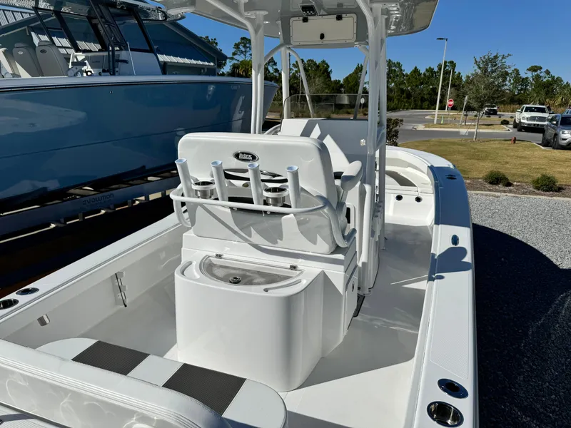 Slide: The Image of 2025 BlackJack 256 Coastal boat interior with seating and rod holders. - 9