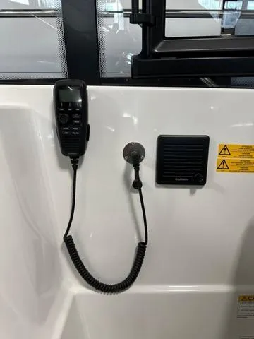 Slide: The Image of 2024 Beneteau Gran Turismo 41 boat communication system with radio and speaker. - 11