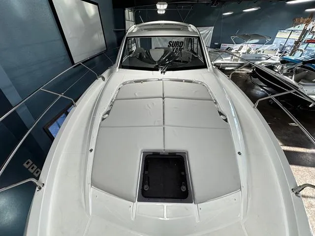 Slide: The Image of 2024 Beneteau Gran Turismo 41 yacht, sleek design, spacious deck, indoor showroom. - 21